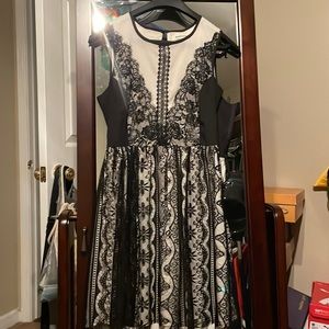 100% Polyester Lace -Knee length (on me and I’m 5”3) Hand washable-eyelet back